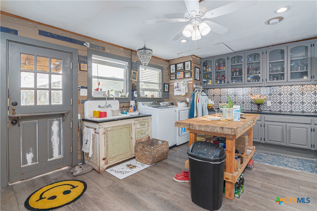 7150 Linne Road Seguin, TX 78155 - Photo 22 of 43 a open kitchen with stainless steel appliances granite countertop a stove and a refrigerator