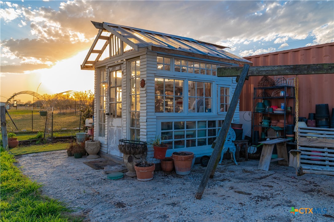 7150 Linne Road Seguin, TX 78155 - Photo 36 of 43 a view of a chair and table in backyard