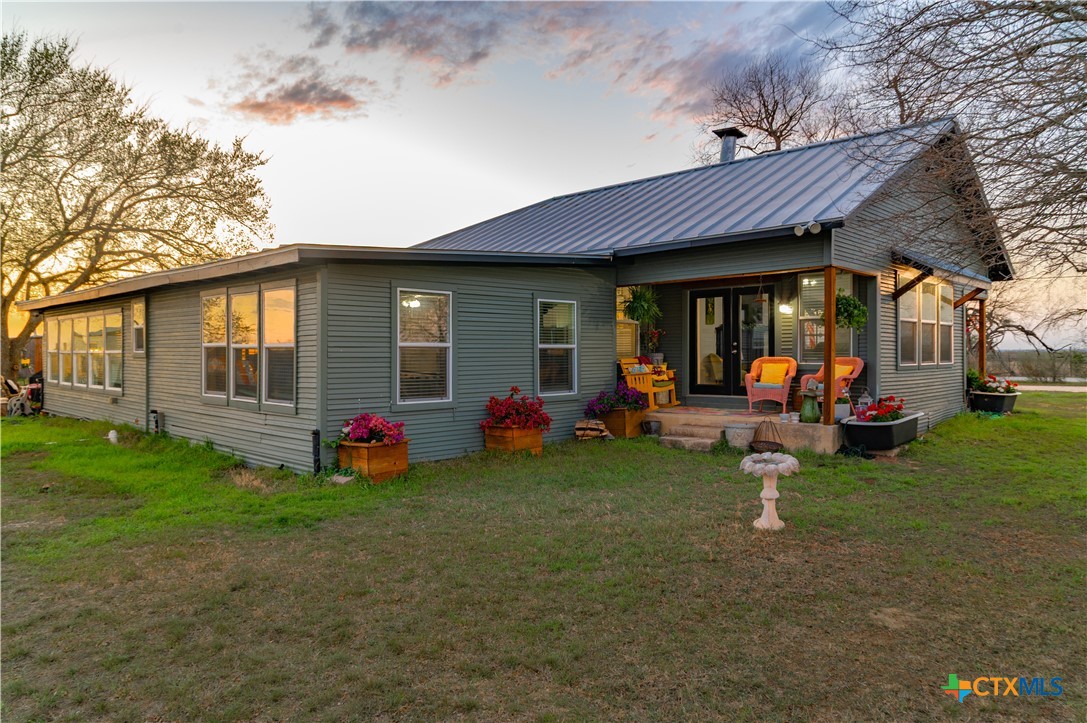 7150 Linne Road Seguin, TX 78155 - Photo 4 of 43 a view of a house with backyard porch and sitting area