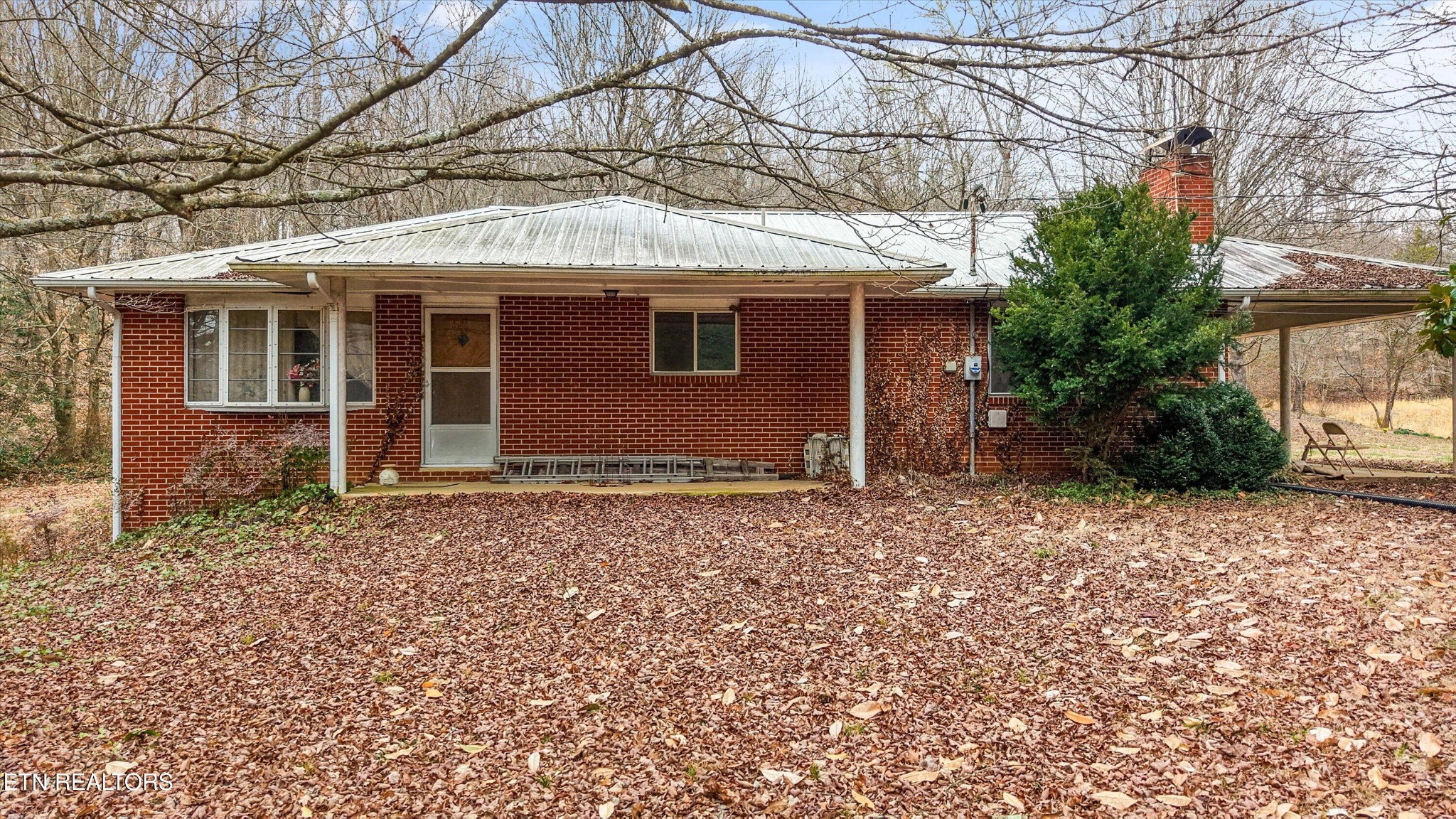 1201 Laurel Bluff Road Kingston, TN 37763 - Photo 2 of 21 a house with a outdoor space