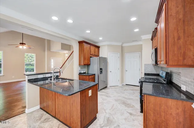 a bathroom with a sink a toilet and a bathtub