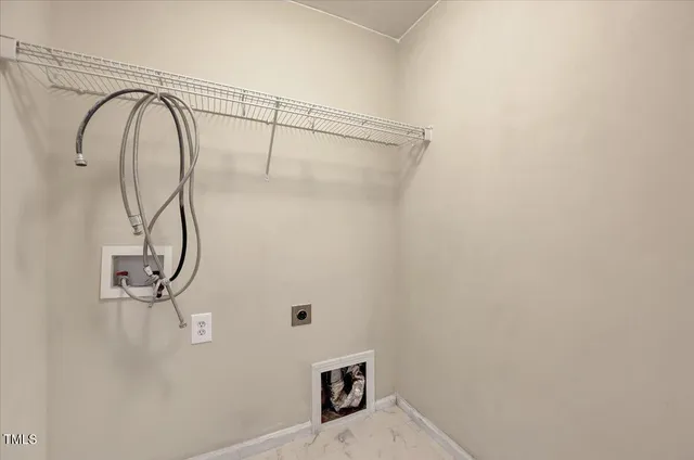 a kitchen with stainless steel appliances granite countertop wooden cabinets and a stove top oven