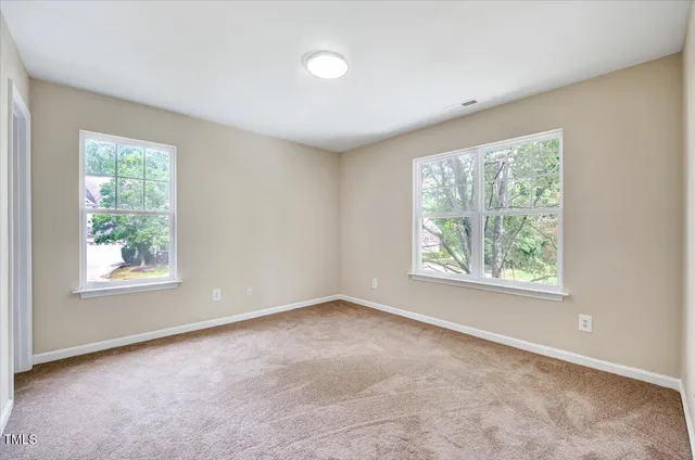 a kitchen with stainless steel appliances granite countertop a stove microwave and sink