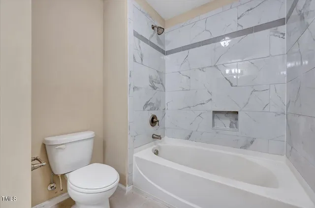 a close view of sliding glass door shower