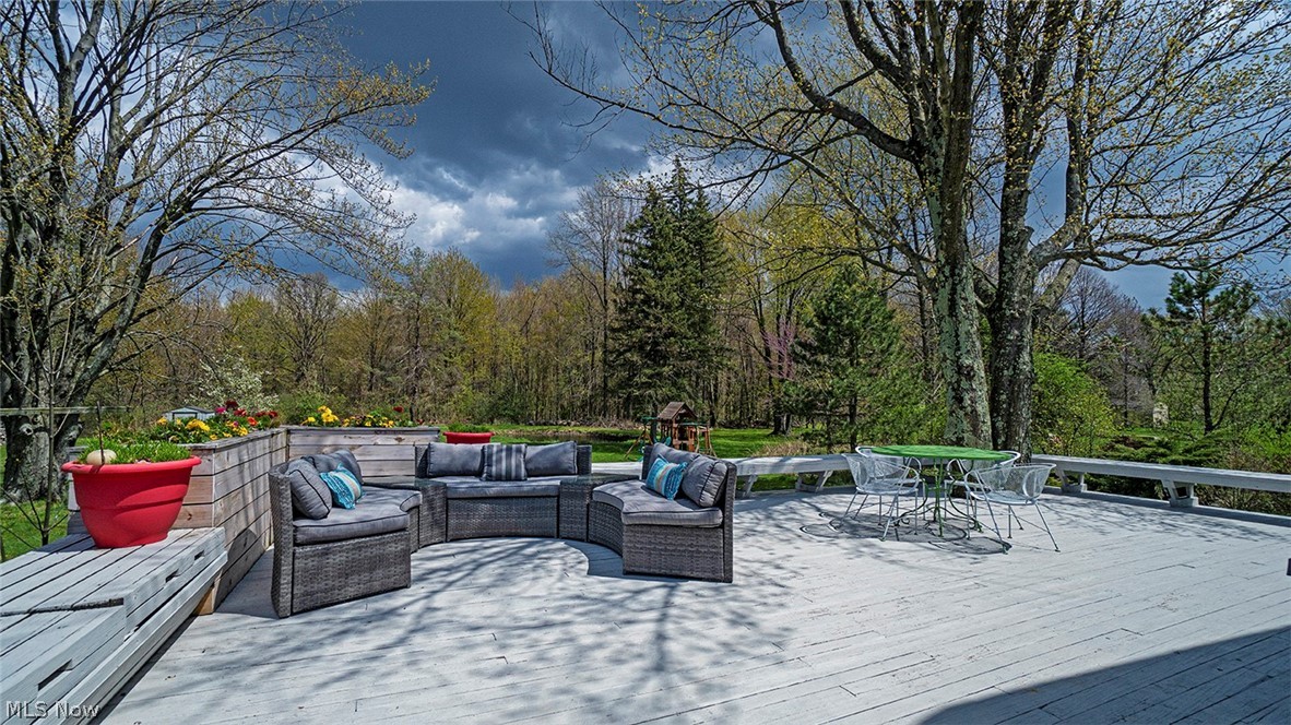4089 Brainard Road Chagrin Falls, OH 44022 - Photo 21 of 25 Huge deck on the back of the home overlooking the deep backyard and featuring custom planters