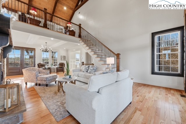 457 Autumn Leaf Way Crumpler, NC 28617 - Photo 13 of 37 a living room with furniture and wooden floor