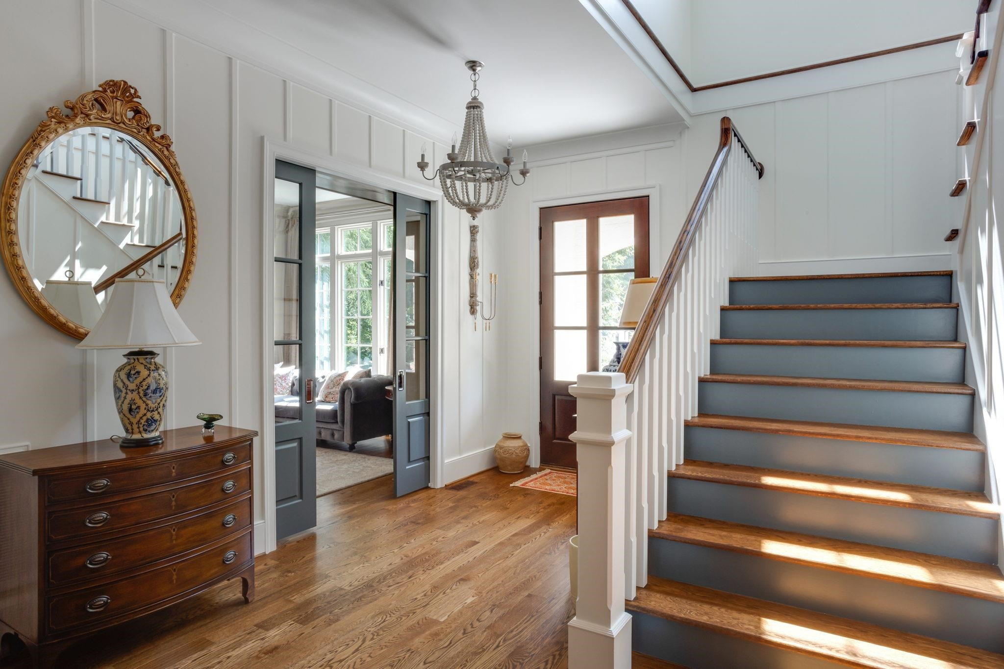 3319 Milton Road Raleigh, NC 27609 - Photo 2 of 7 a view of a entryway door and hallway with wooden floor