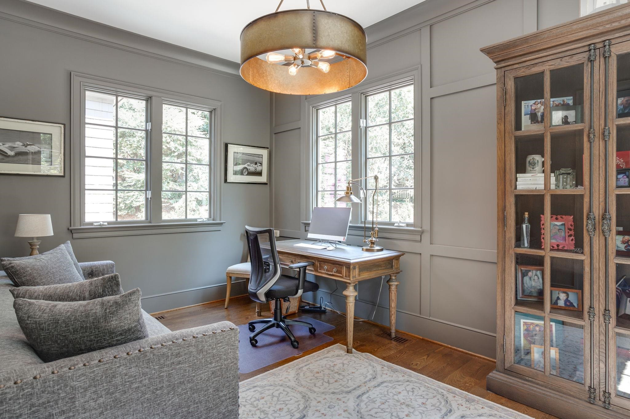 3319 Milton Road Raleigh, NC 27609 - Photo 5 of 7 a view of a livingroom with workspace and a window