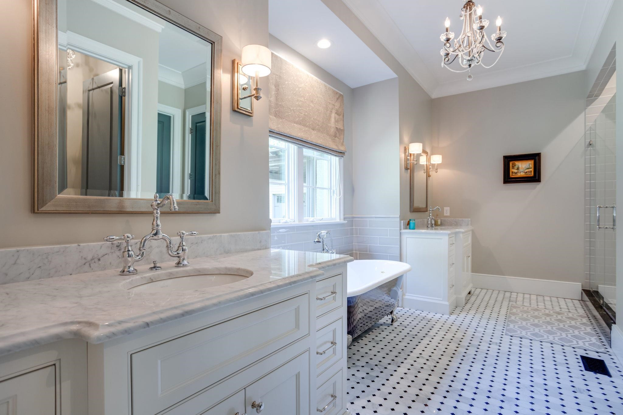 3319 Milton Road Raleigh, NC 27609 - Photo 7 of 7 a bathroom with a sink double vanity granite and a mirror