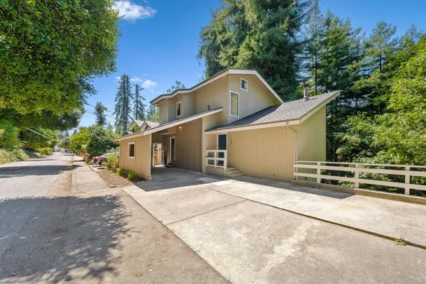 a front view of a house with a garage