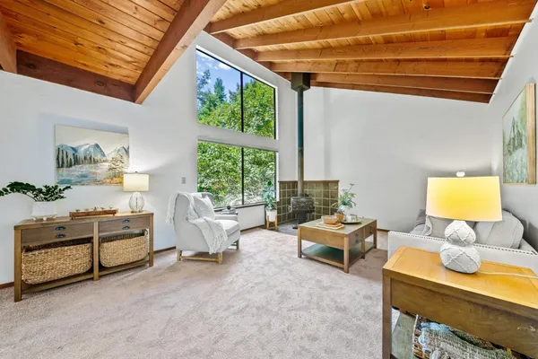 a bedroom with furniture and a window