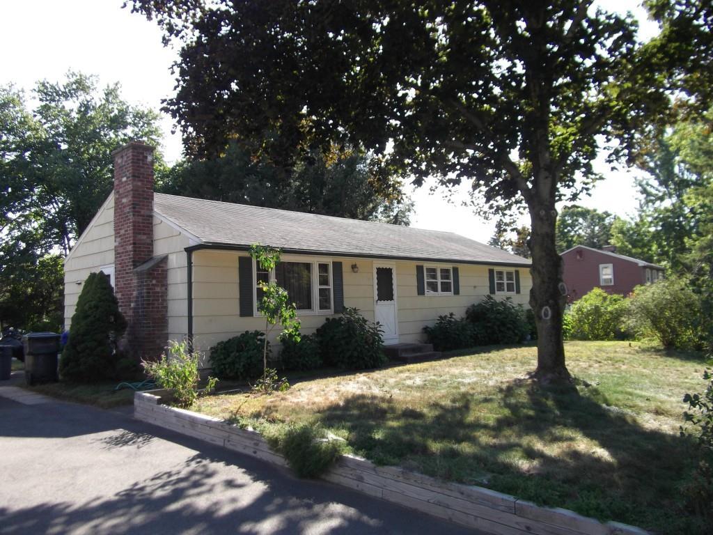 20 Monroe Road Enfield, CT 06082 - Photo 1 of 1 a front view of a house with garden