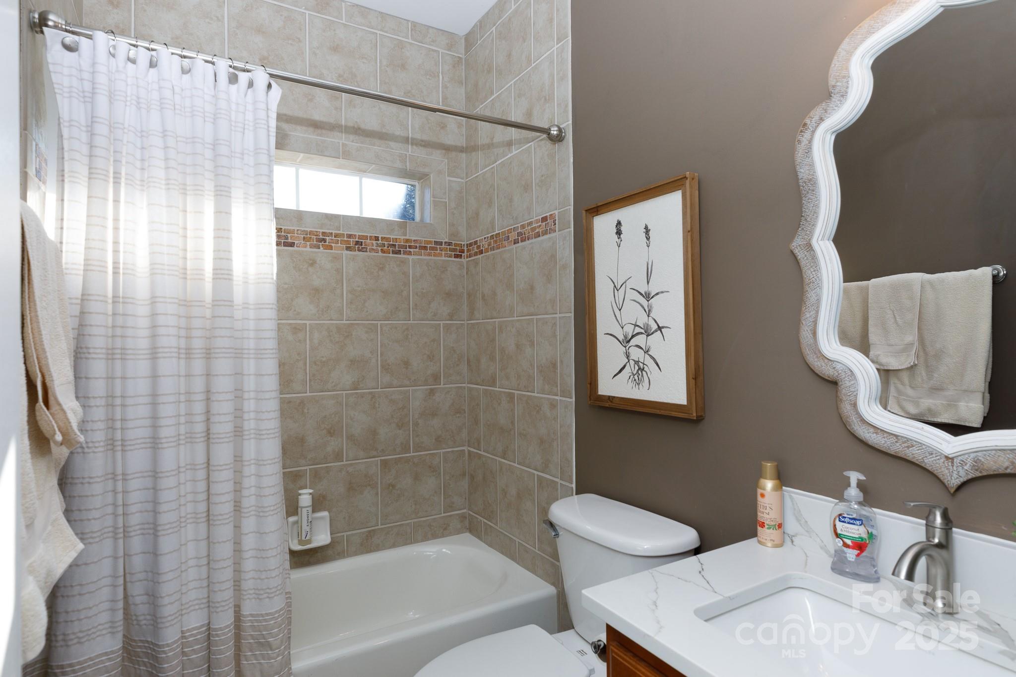 307 Abingdon Way Fort Mill, SC 29715 - Photo 13 of 26 a bathroom with a sink toilet and shower