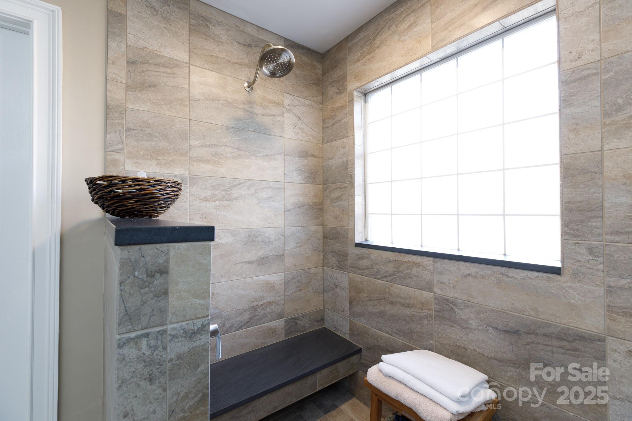 307 Abingdon Way Fort Mill, SC 29715 - Photo 17 of 26 a bathroom with a sink a toilet and shower