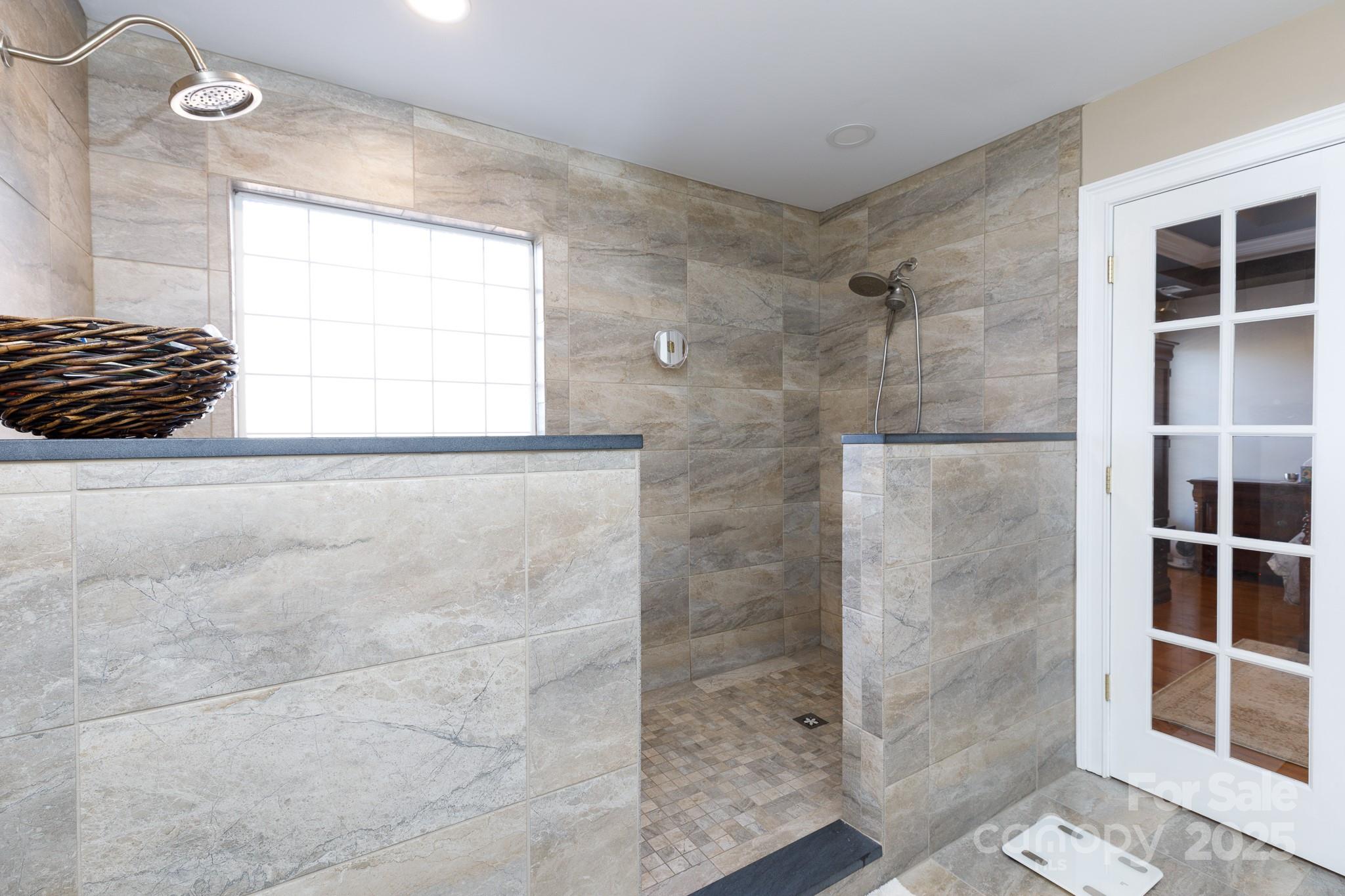 307 Abingdon Way Fort Mill, SC 29715 - Photo 18 of 26 a bathroom with a bathtub and a shower
