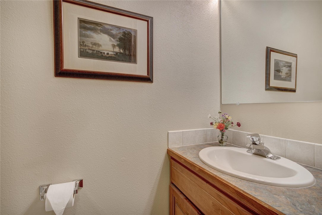 592 Ryan Gulch Road Silverthorne, CO 80498 - Photo 15 of 35 Main floor powder bathroom is adjacent to the laundry room.