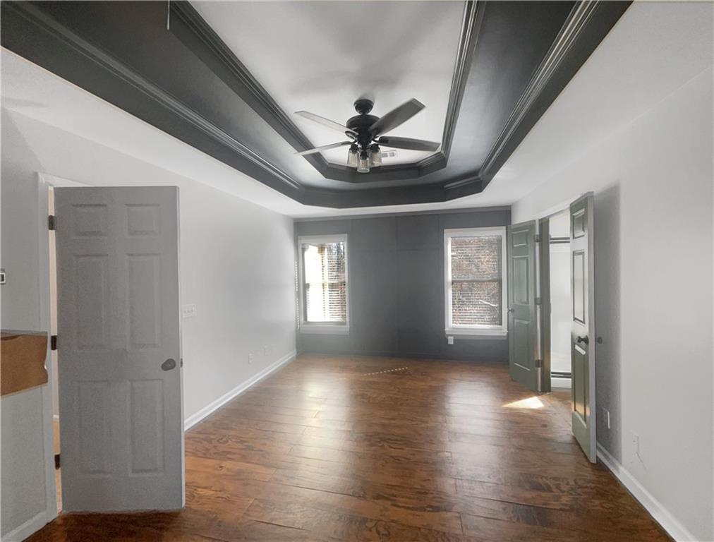3950 Bear Ridge Place Northwest Kennesaw, GA 30144 - Photo 18 of 41 a view of livingroom with hardwood floor and window