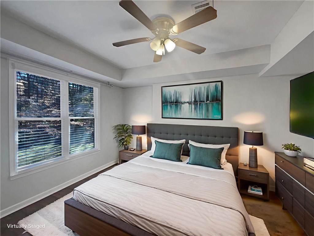 3950 Bear Ridge Place Northwest Kennesaw, GA 30144 - Photo 20 of 41 a bedroom with a large bed and a window