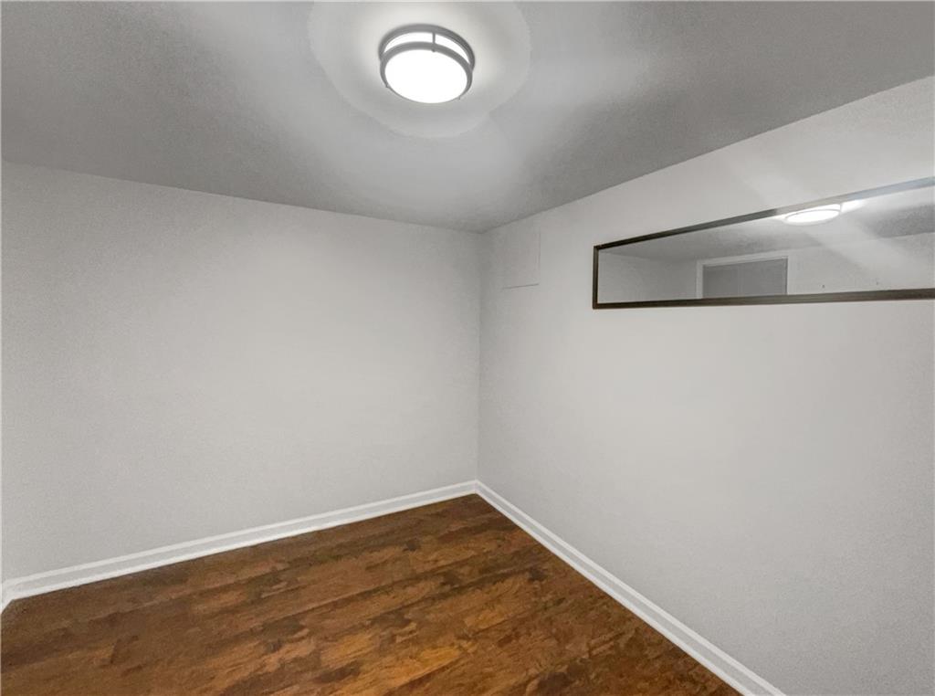 3950 Bear Ridge Place Northwest Kennesaw, GA 30144 - Photo 24 of 41 a view of a room with wooden floor