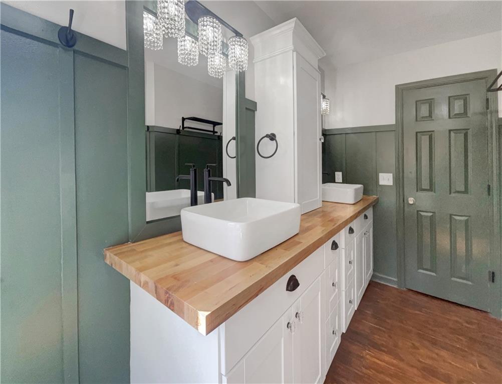 3950 Bear Ridge Place Northwest Kennesaw, GA 30144 - Photo 31 of 41 a bathroom with a sink and a mirror