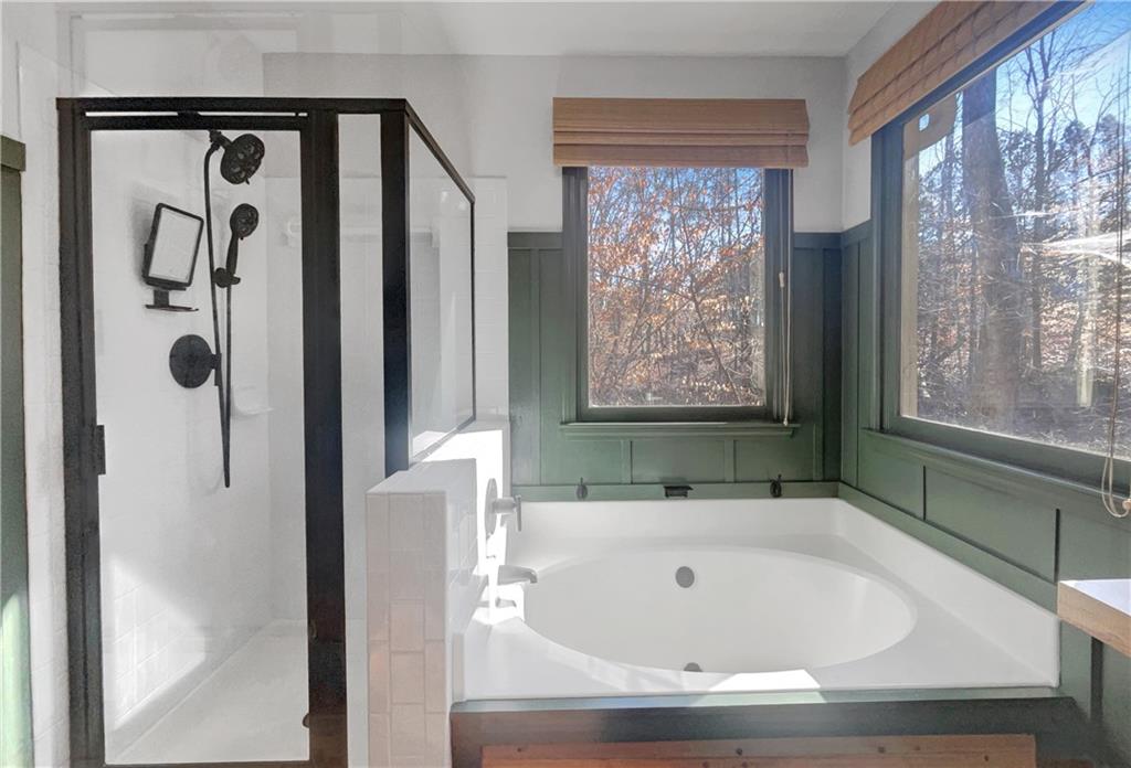 3950 Bear Ridge Place Northwest Kennesaw, GA 30144 - Photo 32 of 41 a bathroom with shower and bathtub