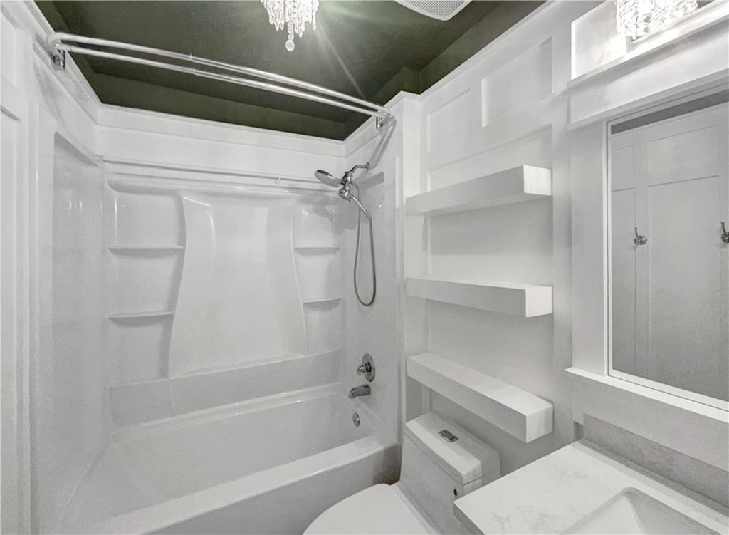 3950 Bear Ridge Place Northwest Kennesaw, GA 30144 - Photo 34 of 41 a bathroom with a shower and toilet