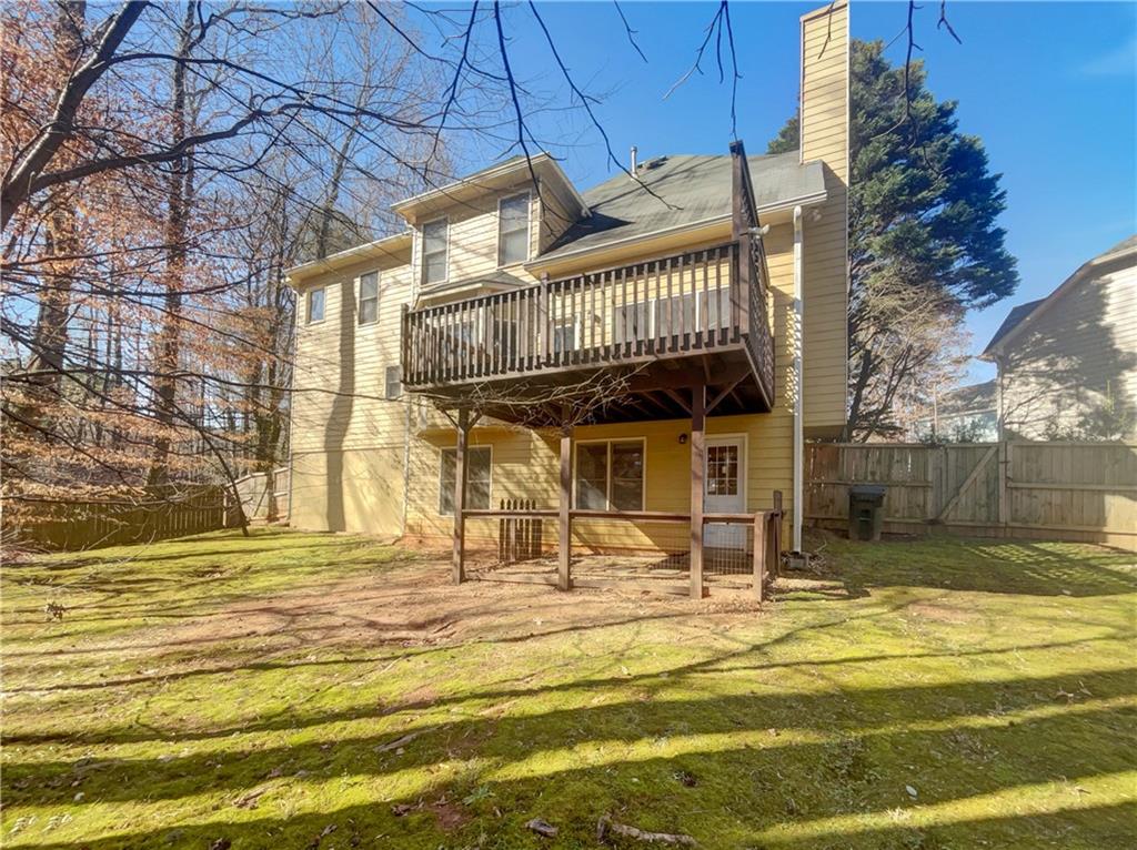 3950 Bear Ridge Place Northwest Kennesaw, GA 30144 - Photo 38 of 41 a view of a house with a swimming pool