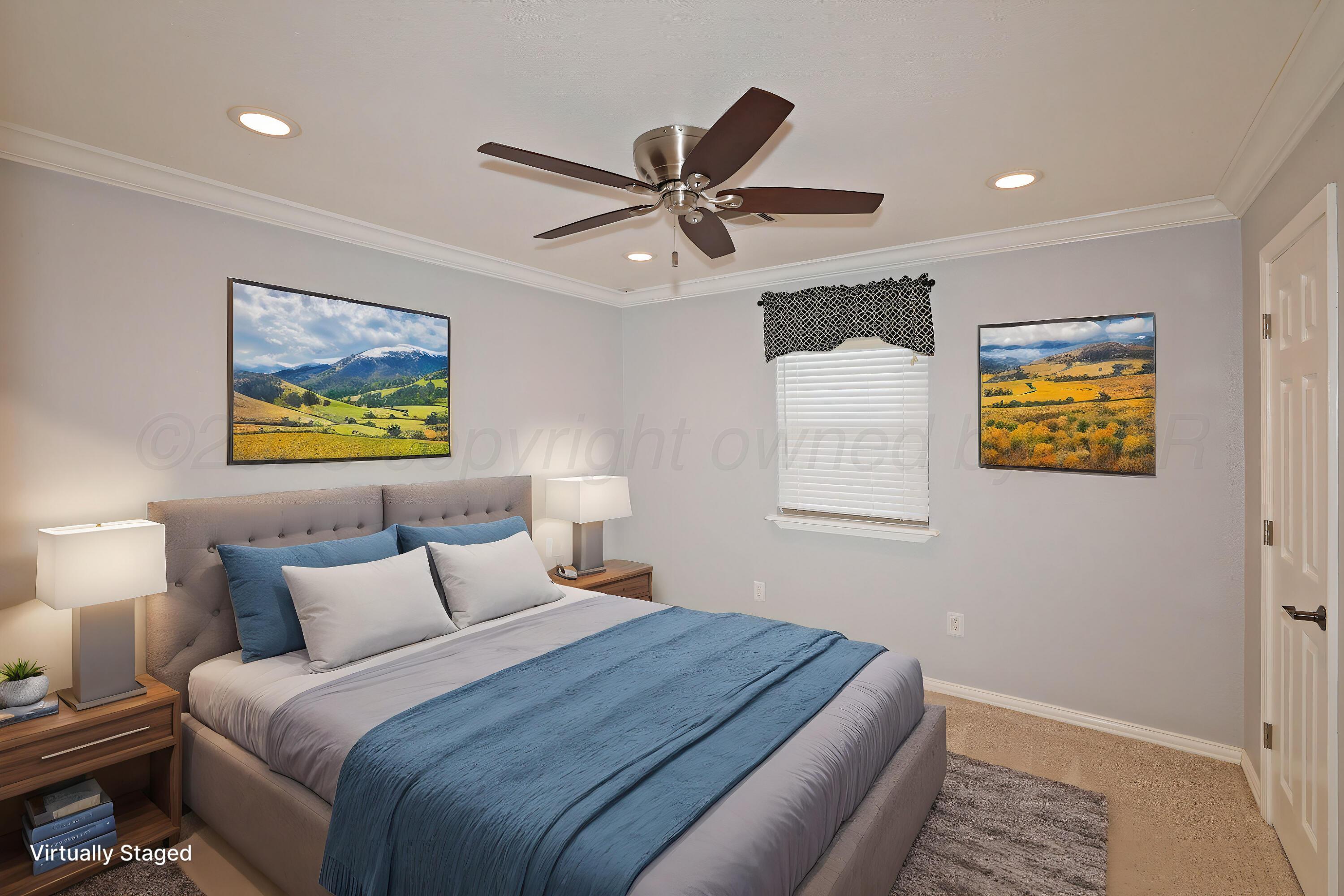 7722 Canode Drive Amarillo, TX 79121 - Photo 21 of 40 a bedroom with a bed and a painting on the wall