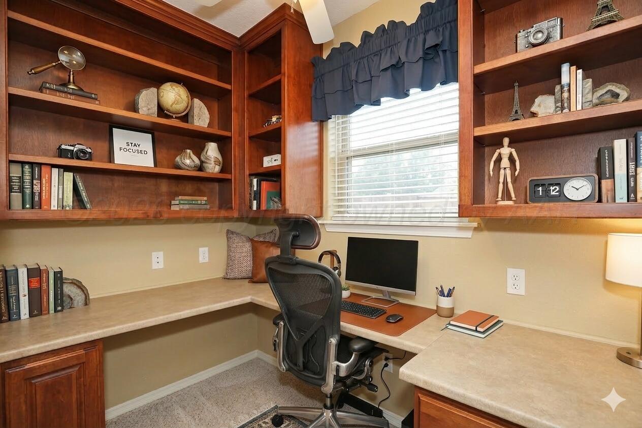 7722 Canode Drive Amarillo, TX 79121 - Photo 32 of 40 a view of a workspace with furniture