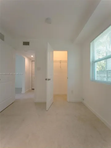 a view of a backyard with plants