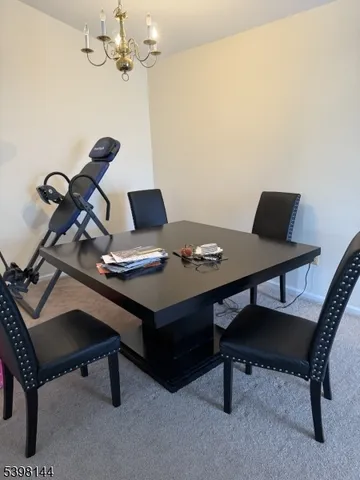 a view of a workspace with furniture