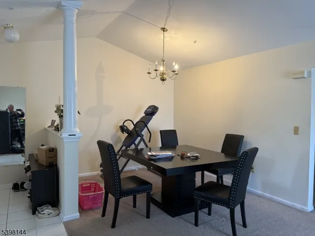 a view of a workspace with furniture