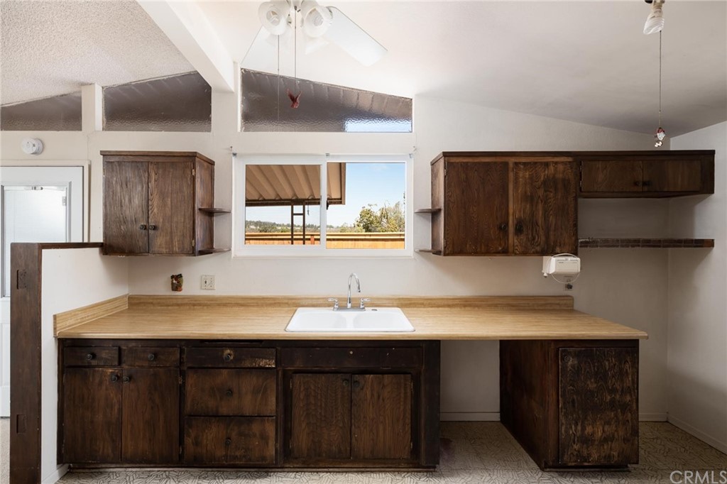 12540 Taunt Place Poway, CA 92064 - Photo 13 of 36 a bathroom with a sink and a mirror