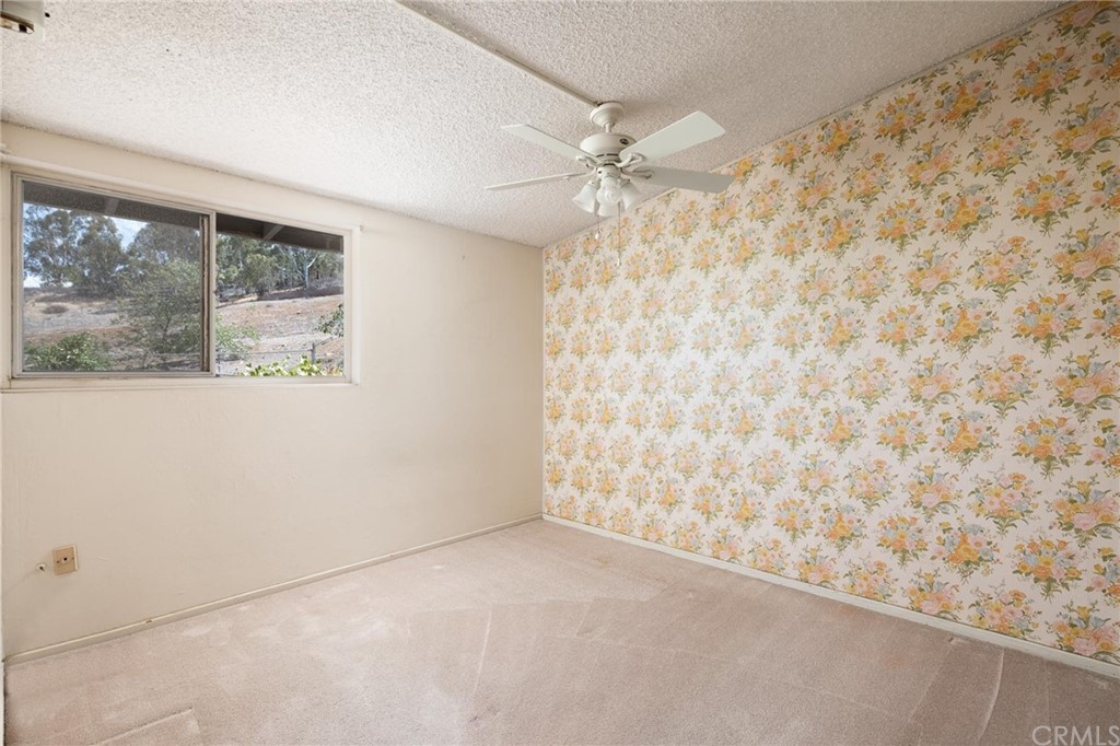 12540 Taunt Place Poway, CA 92064 - Photo 20 of 36 an empty room with a window