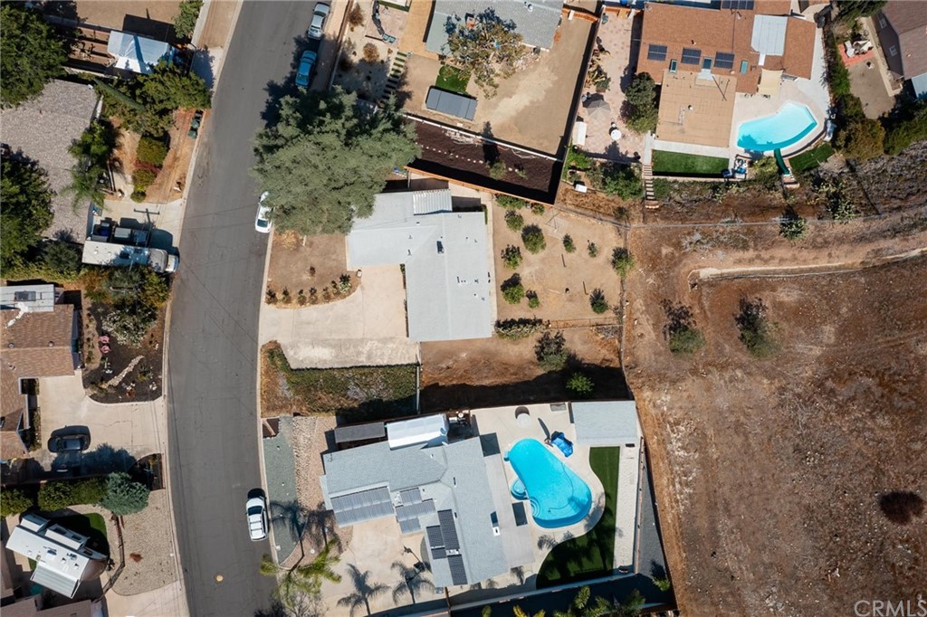 12540 Taunt Place Poway, CA 92064 - Photo 2 of 36 an aerial view of a fireplace with outdoor space