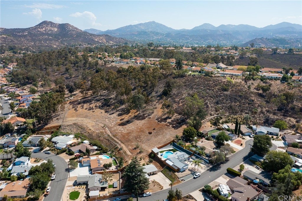 12540 Taunt Place Poway, CA 92064 - Photo 30 of 36 an aerial view of residential houses with outdoor space and trees