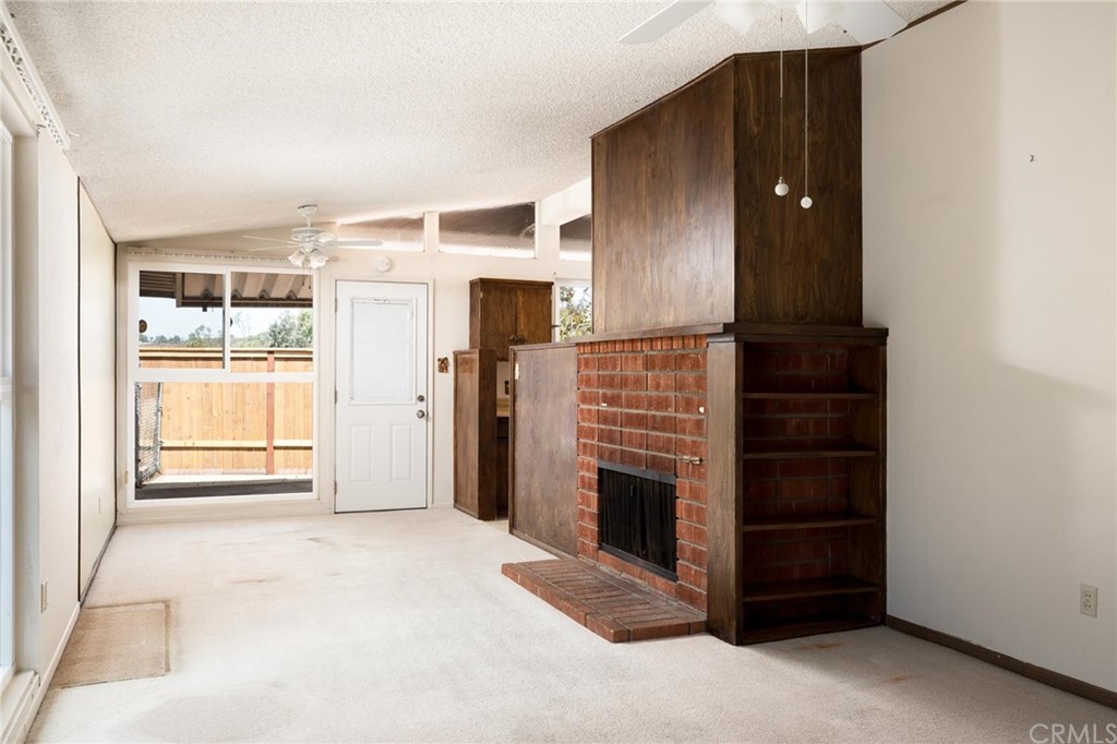 12540 Taunt Place Poway, CA 92064 - Photo 8 of 36 a view of kitchen with stainless steel appliances wooden floor and view living room