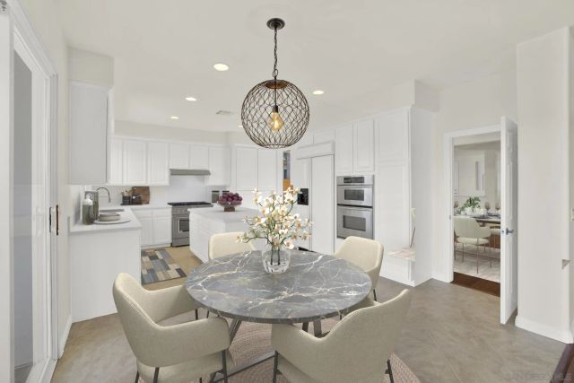 a kitchen with sink cabinets and window