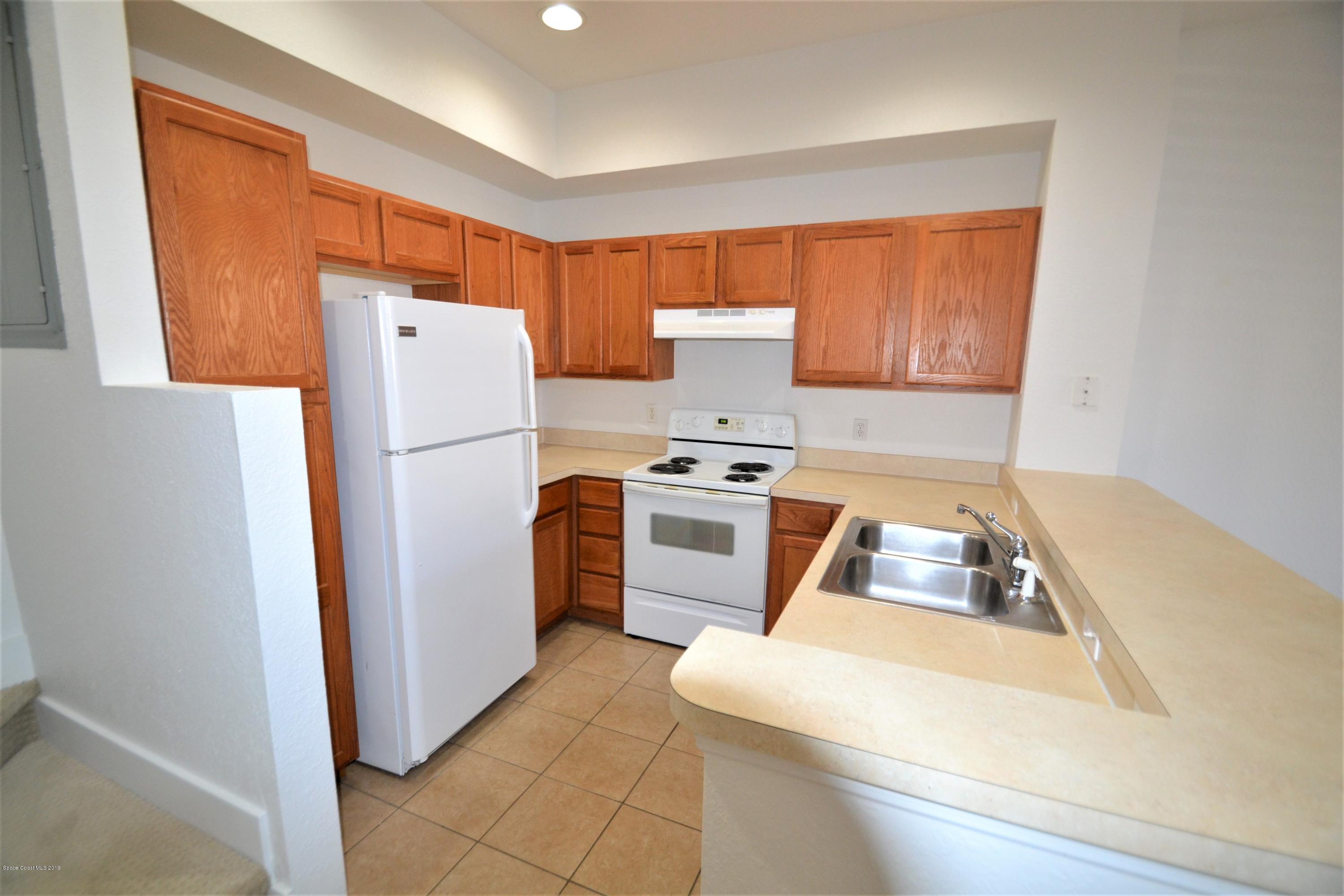115 Turpial Way, Unit 103 Melbourne, FL 32901 - Photo 2 of 38 115 Turpial #103 Kitchen (3)