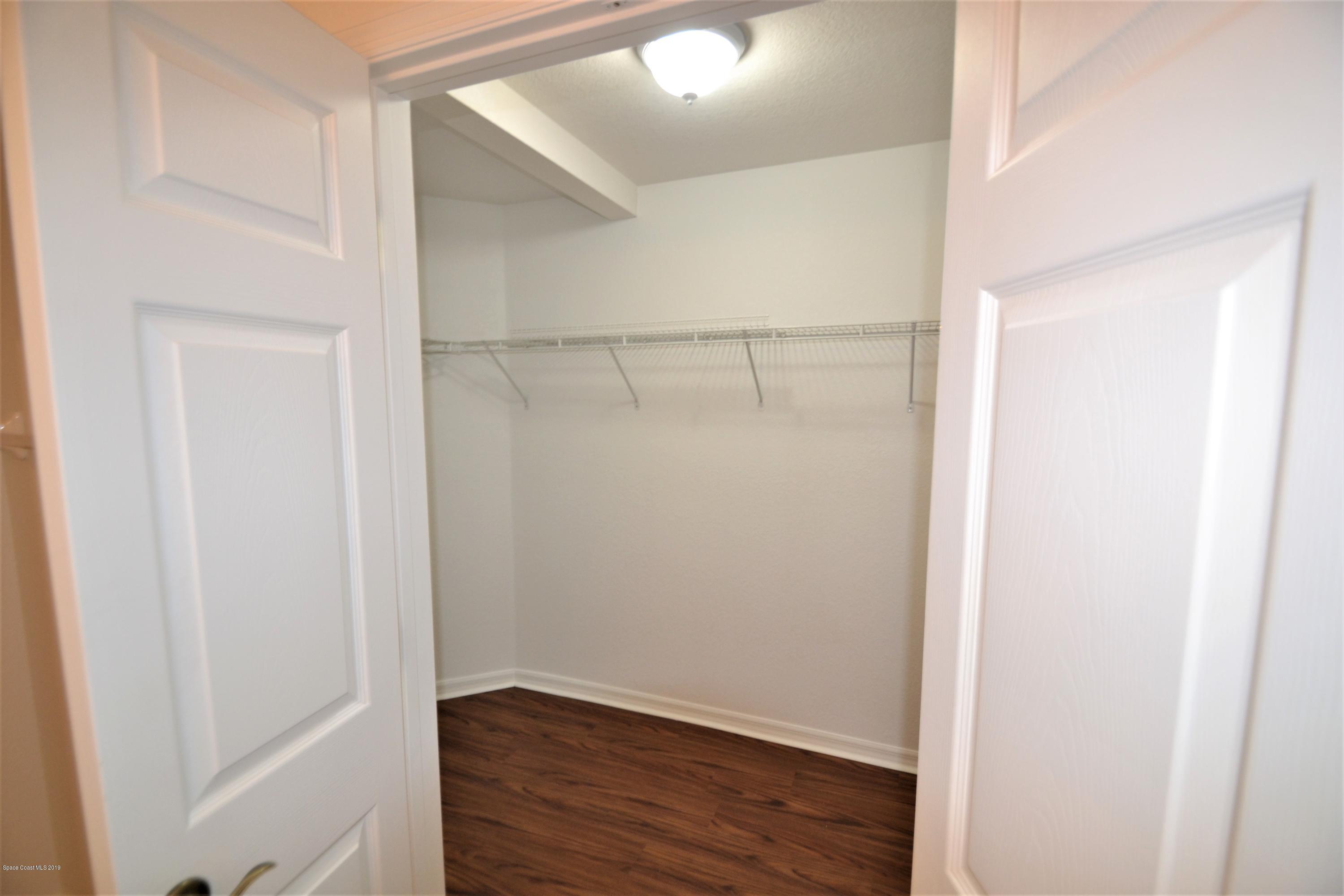 115 Turpial Way, Unit 103 Melbourne, FL 32901 - Photo 18 of 38 115 Turpial #103 Master Suite (26)