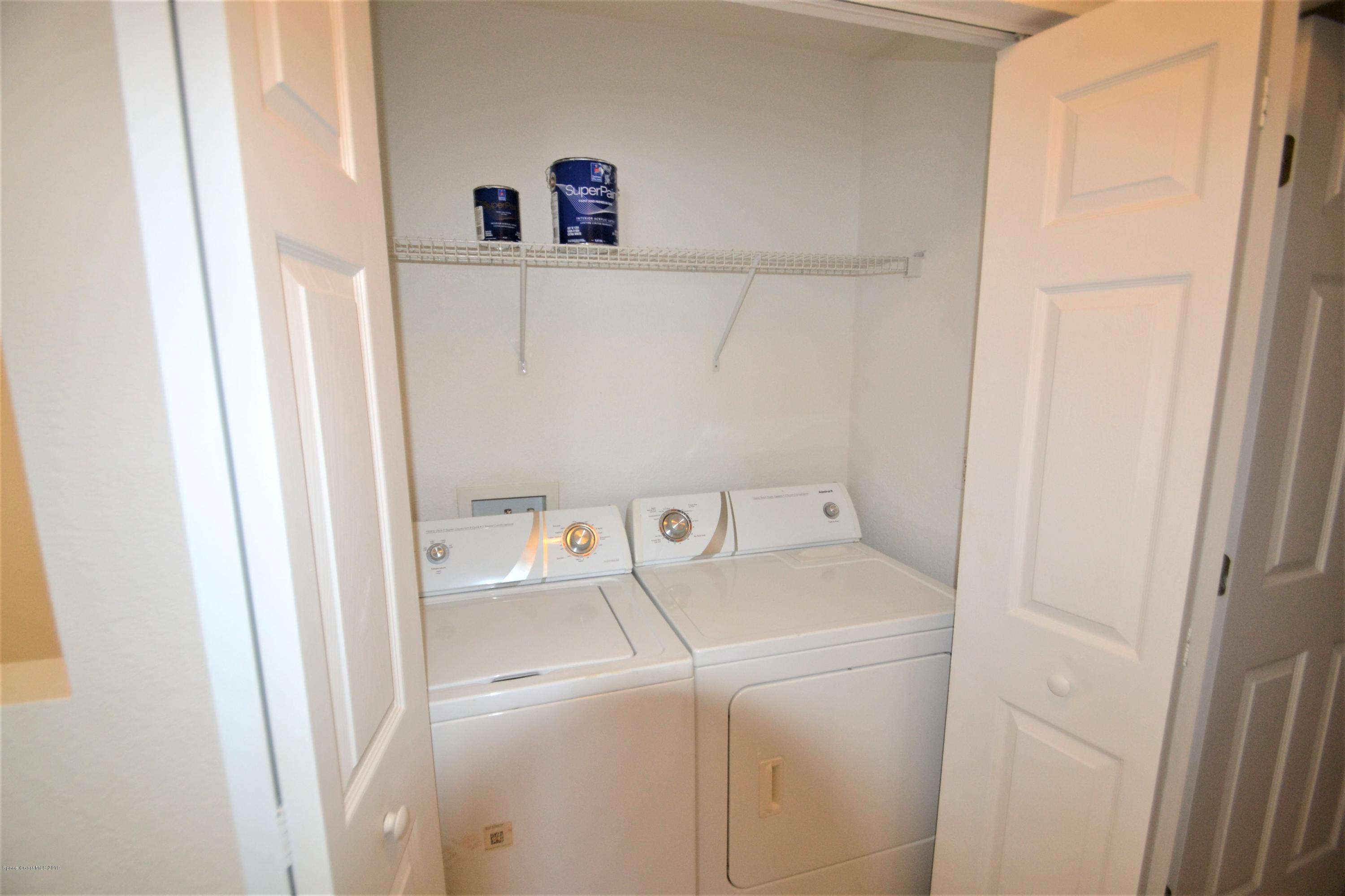 115 Turpial Way, Unit 103 Melbourne, FL 32901 - Photo 21 of 38 115 Turpial #103 Laundry (2)