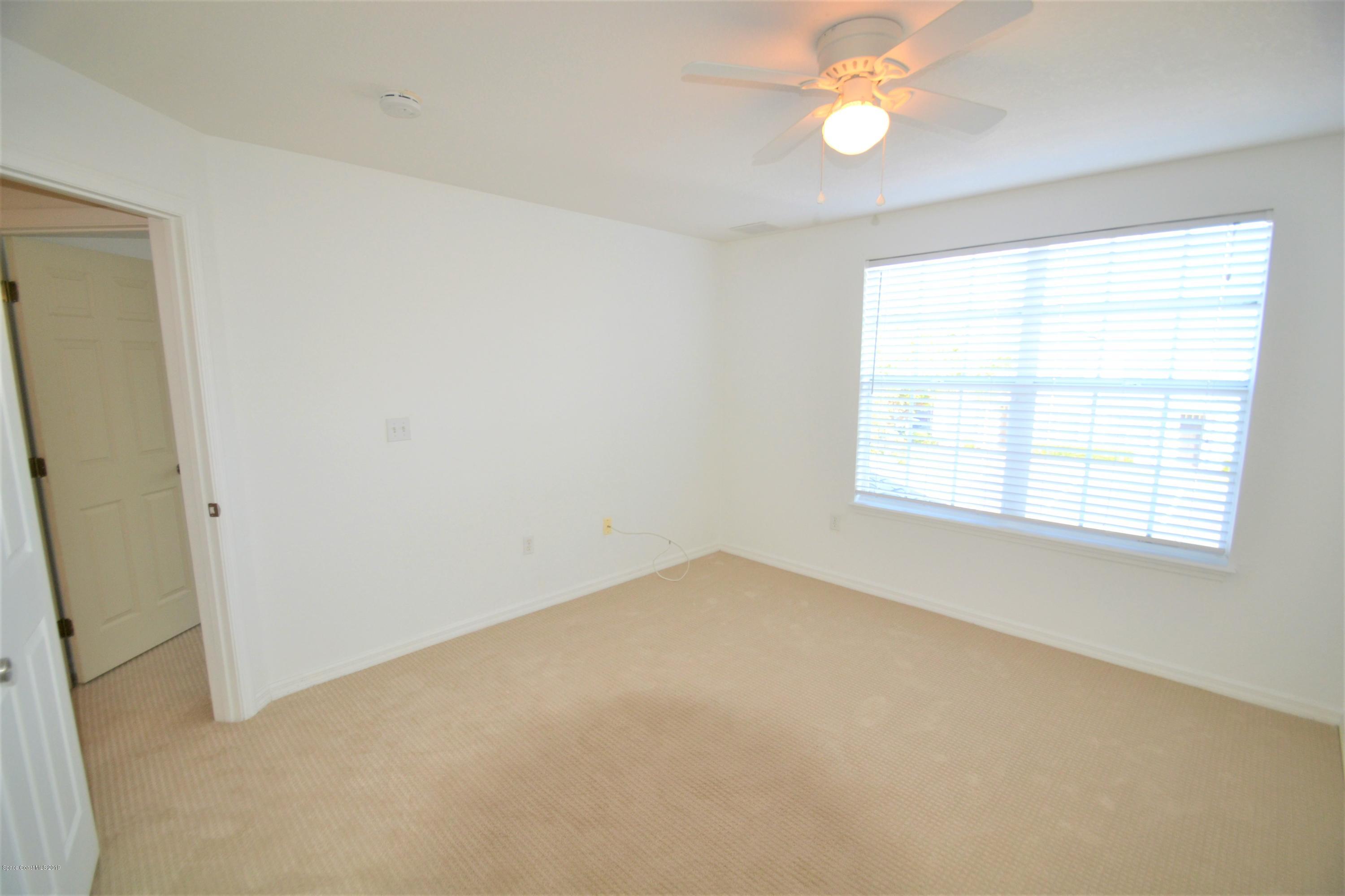 115 Turpial Way, Unit 103 Melbourne, FL 32901 - Photo 25 of 38 115 Turpial #103 Second Bedroom (10)