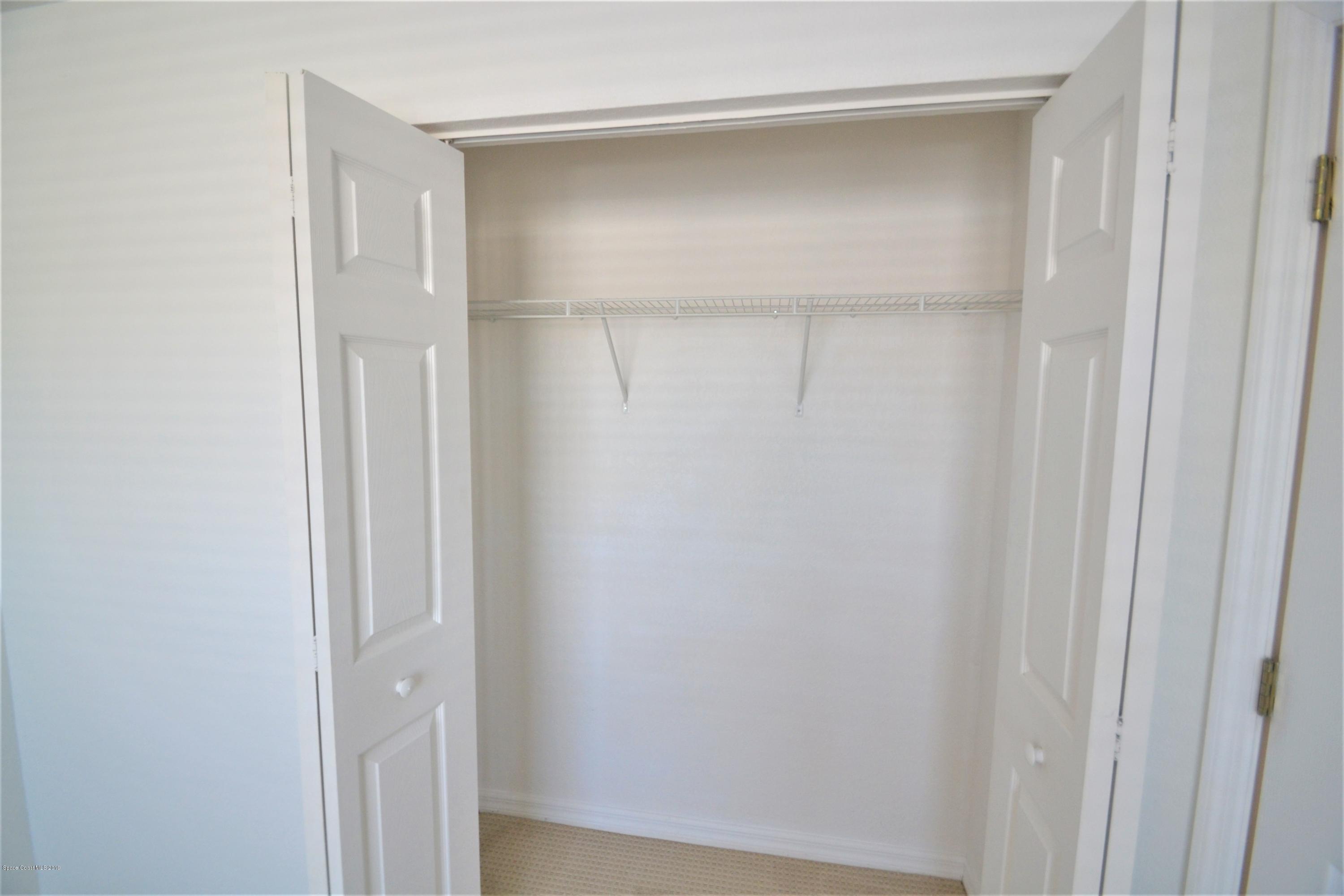 115 Turpial Way, Unit 103 Melbourne, FL 32901 - Photo 26 of 38 115 Turpial #103 Second Bedroom (11)