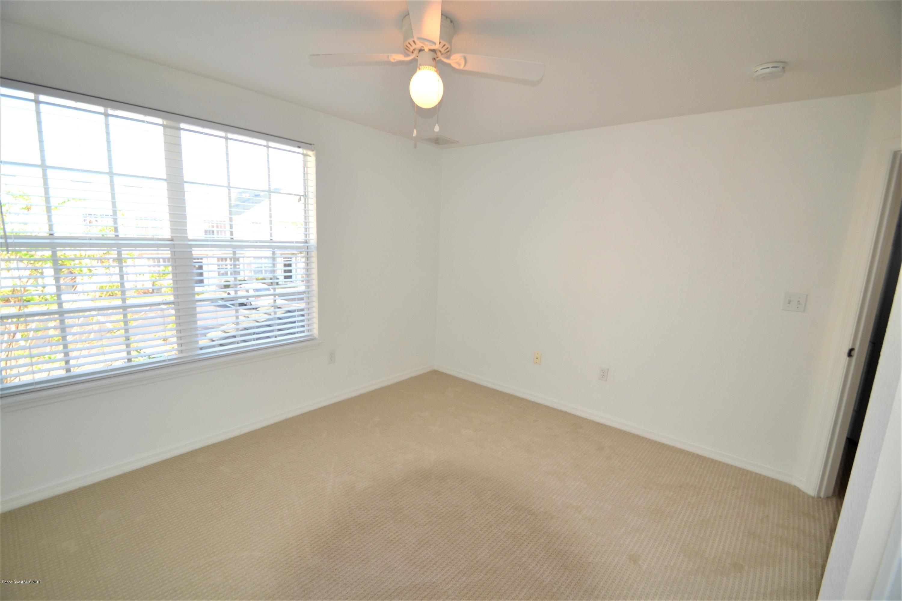 115 Turpial Way, Unit 103 Melbourne, FL 32901 - Photo 28 of 38 115 Turpial #103 Third Bedroom (4)
