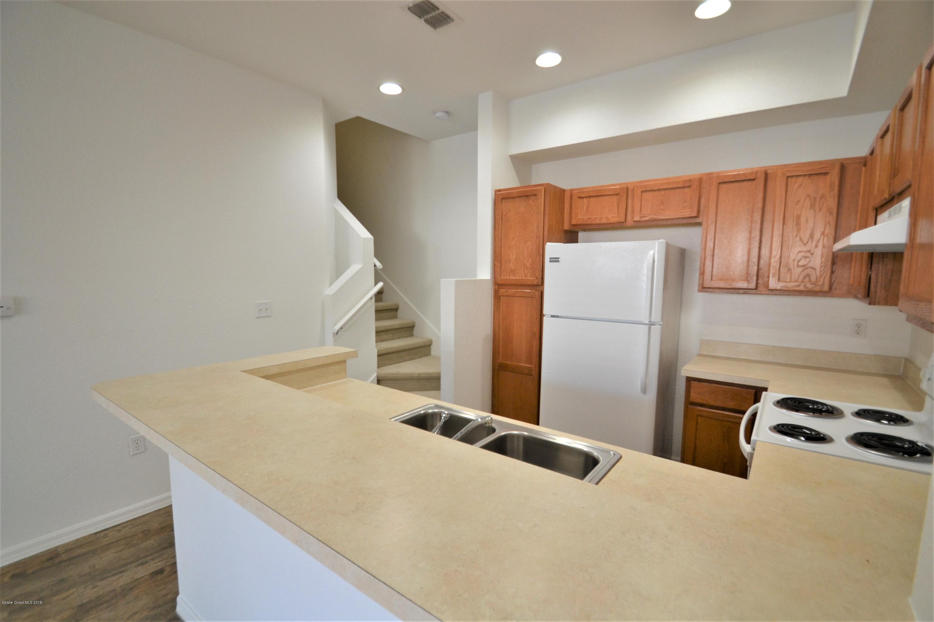 115 Turpial Way, Unit 103 Melbourne, FL 32901 - Photo 9 of 38 115 Turpial #103 Kitchen (1)