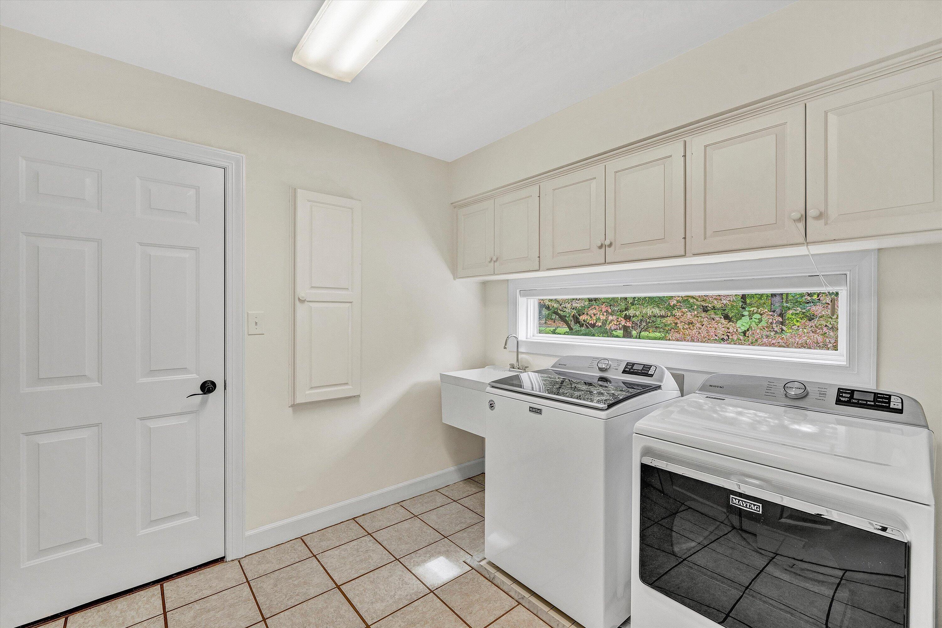 30 Island Green Circle, Unit 22 Penhook, VA 24137 - Photo 20 of 53 a utility room with dryer and washer