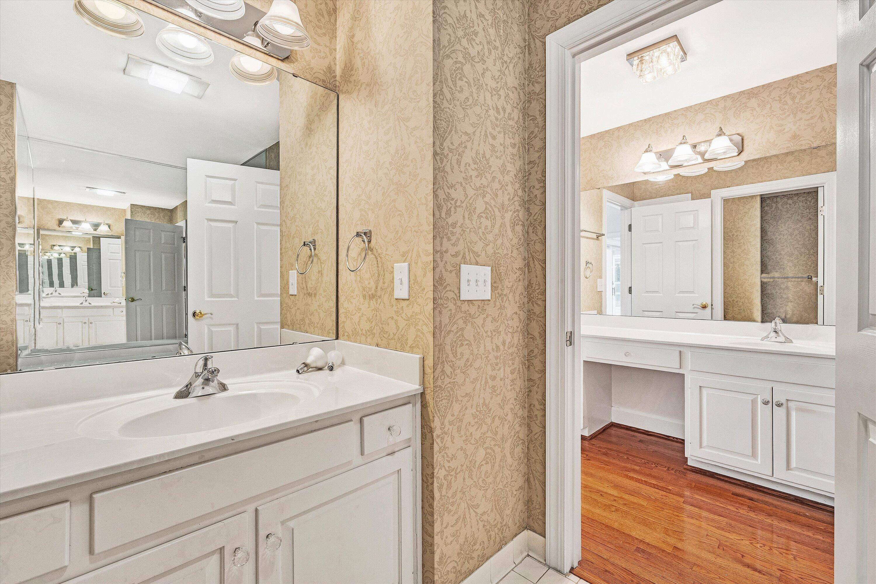 30 Island Green Circle, Unit 22 Penhook, VA 24137 - Photo 23 of 53 a bathroom with a sink double vanity and a mirror
