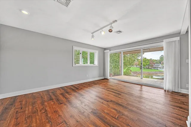 a view of entryway with wooden floor