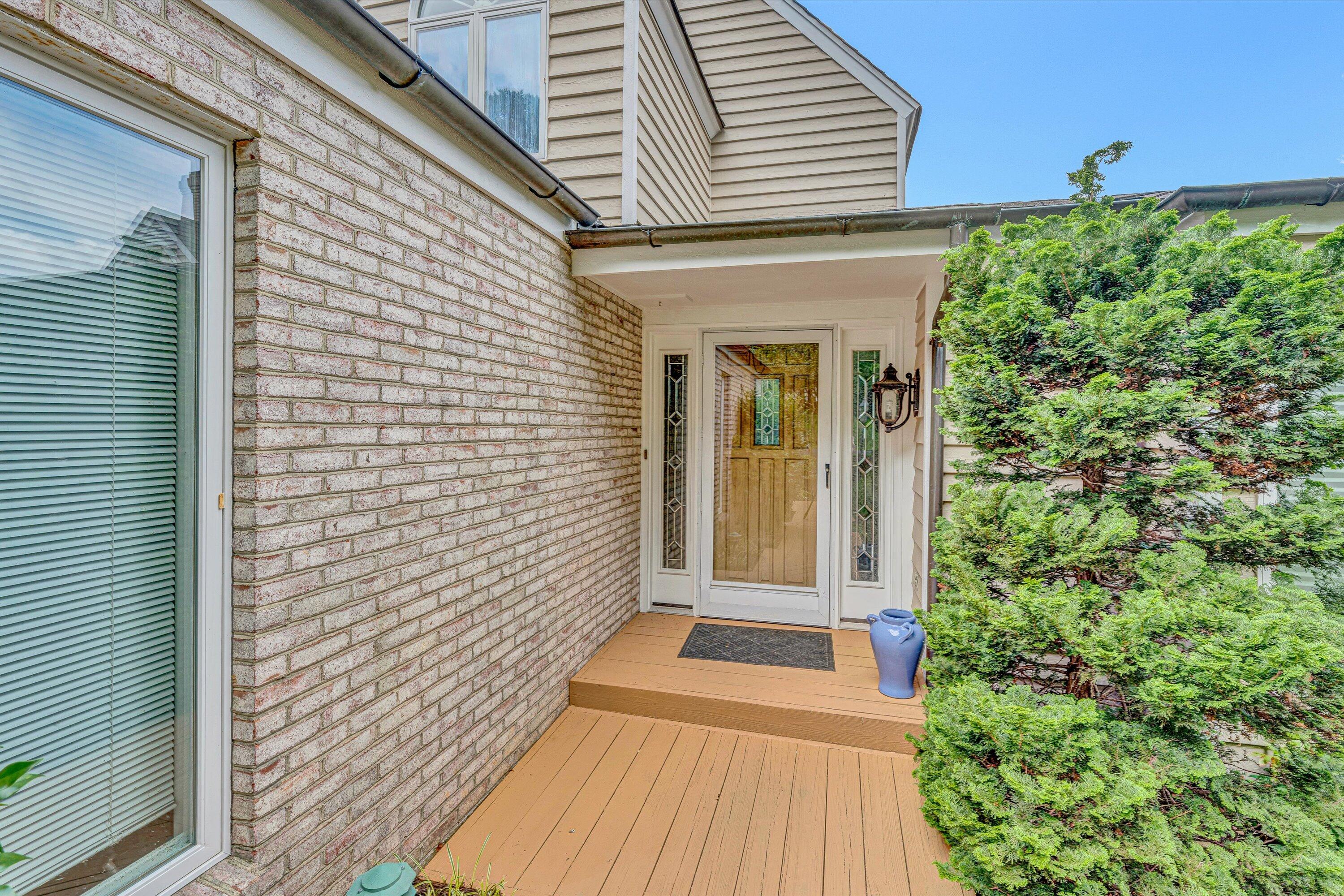 30 Island Green Circle, Unit 22 Penhook, VA 24137 - Photo 6 of 53 a view of a brick house with a large window