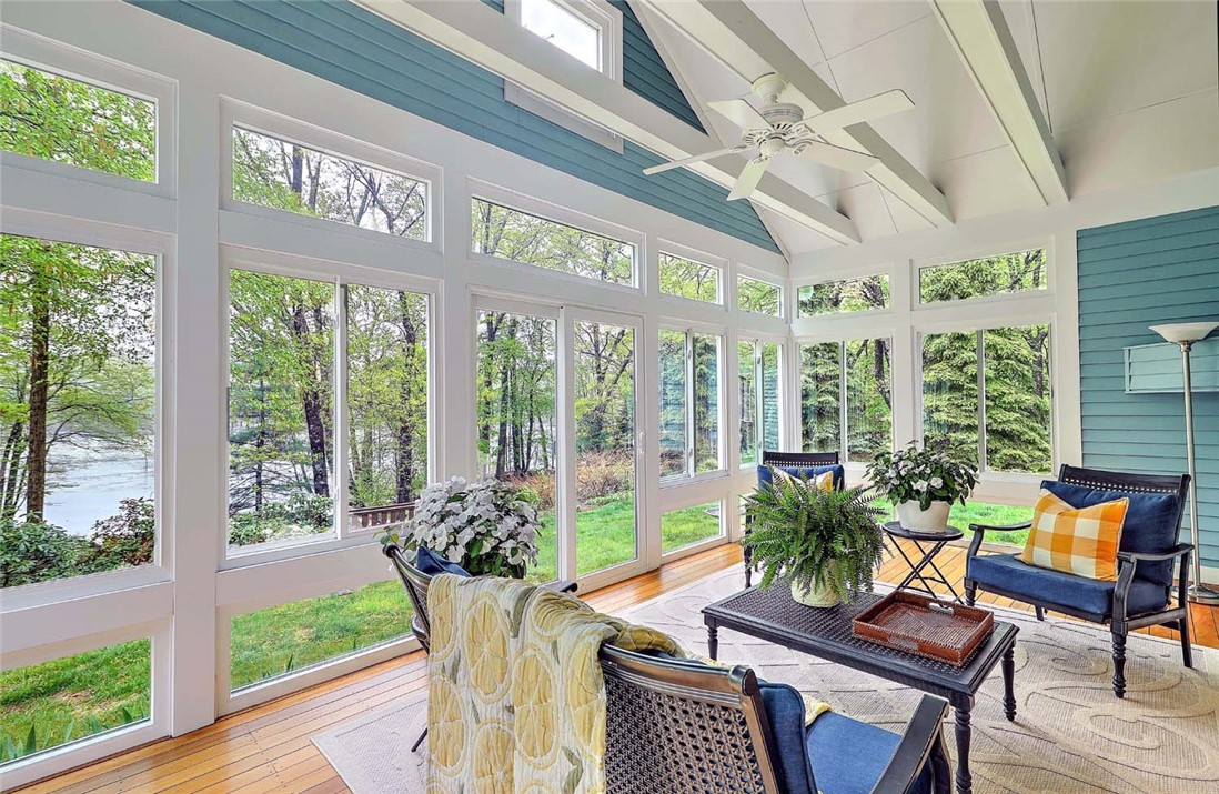 66 Tarklin Road Smithfield, RI 02814 - Photo 25 of 50 Bright and Sunny 3 season room with views of the pond and private backyard